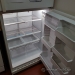 White GE Fridge with Top Load Freezer